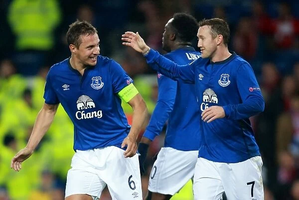 Everton's Jagielka and McGeady Celebrate Europa League Goals vs. Lille