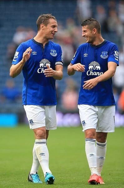 Everton's Jagielka and Mirallas: Celebrating Victory at The Hawthorns Against West Bromwich Albion