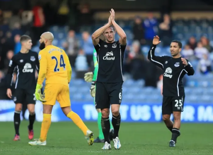 Framed Print : Everton's Jagielka Salutes Fans: Triumphant Moment After Queens Park Rangers Victory Framed Print : Everton's Jagielka Salutes Fans: Triumphant Moment After Queens Park Rangers Victory