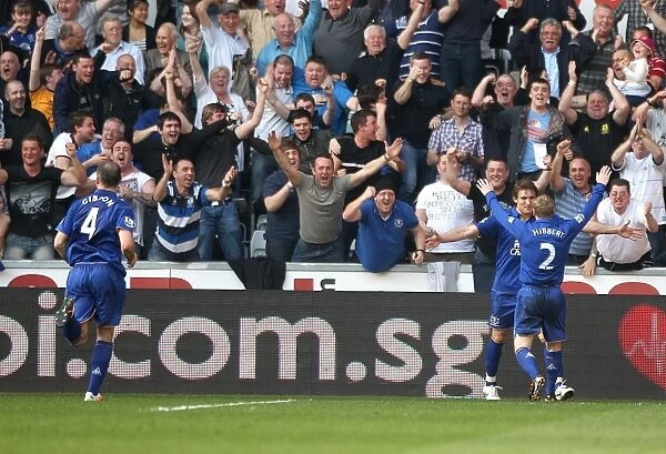 Everton's Jelavic and Hibbert: Celebrating a Memorable Second Goal Against Swansea City (24 March 2012)