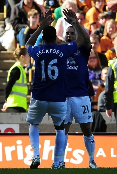 Everton's Jermaine Beckford and Leon Osman: Celebrating the Opening Goal Against Wolverhampton Wanderers in the Premier League (April 9, 2011)