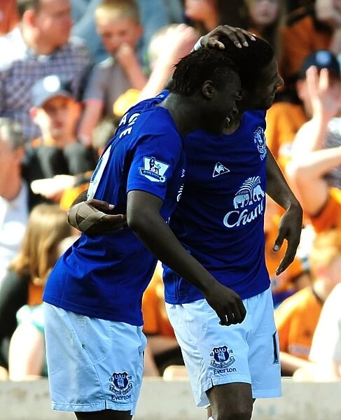 Everton's Jermaine Beckford and Magaye Gueye: Celebrating the Opening Goal Against Wolverhampton Wanderers in the Premier League (April 9, 2011)