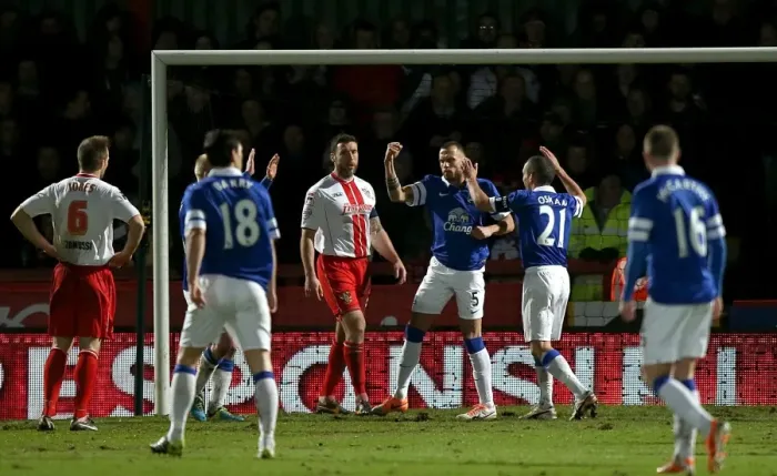Framed Print : Everton's Johnny Heitinga: Celebrating a Triumphant Hat-trick in FA Cup Fourth Round Win Against Stevenage (25.01.2014)