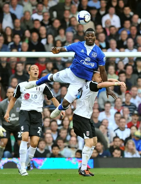 Framed Print : Everton's Joseph Yobo vs. Fulham's Andrew Johnson: Aerial Battle in the Premier League Framed Print : Everton's Joseph Yobo vs. Fulham's Andrew Johnson: Aerial Battle in the Premier League