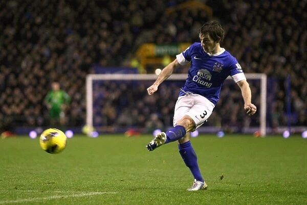 Everton's Leighton Baines in Action: Securing Victory over Wigan Athletic in the Barclays Premier League (26-12-2012)