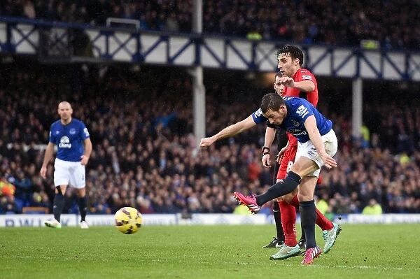 Everton's Leighton Baines Unleashes a Powerful Shot vs Leicester City at Goodison Park