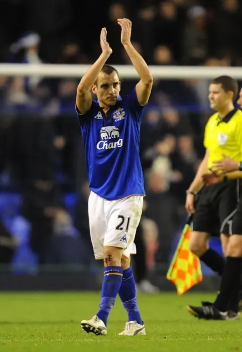 Framed Print : Everton's Leon Osman Salutes Home Fans After Everton FC's Victory Over Swansea City (21 December 2011, Goodison Park) Framed Print : Everton's Leon Osman Salutes Home Fans After Everton FC's Victory Over Swansea City (21 December 2011, Goodison Park)