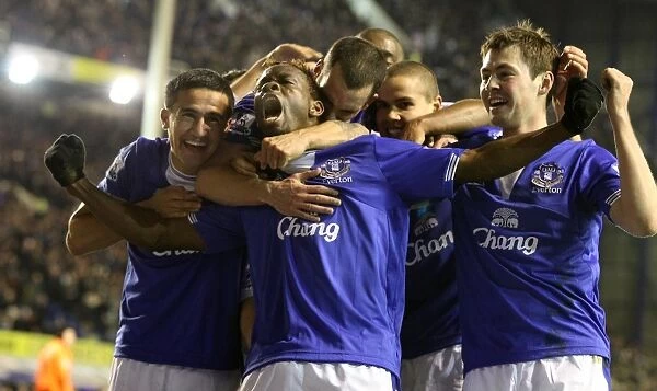 Everton's Louis Saha: A Moment of Triumph – Celebrating a Goal with Teamsmates vs. Chelsea at Goodison Park