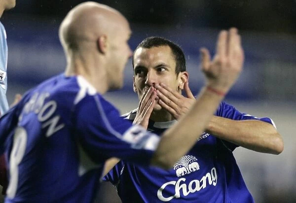 Evertons Osman celebrates with Johnson after scoring during their English Premier League soccer mat