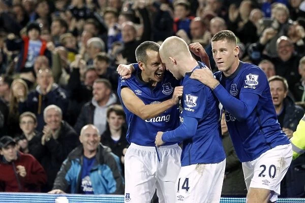 Everton's Osman, Naismith, and Barkley: Triumphant Trio Celebrates Second Goal vs. West Ham