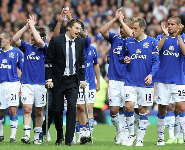 Everton's Phil Jagielka Celebrates Victory with Team Mates at Goodison Park