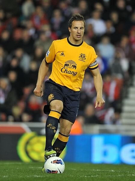 Everton's Phil Jagielka Leads the Charge Against Stoke City at Britannia Stadium (May 2012, Barclays Premier League)