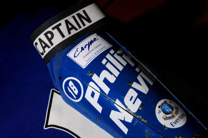 Framed Print : Everton's Phil Neville: Gearing Up for Pre-Season with Shinpads and Captain's Armband at Melbourne Heart's Etihad Stadium