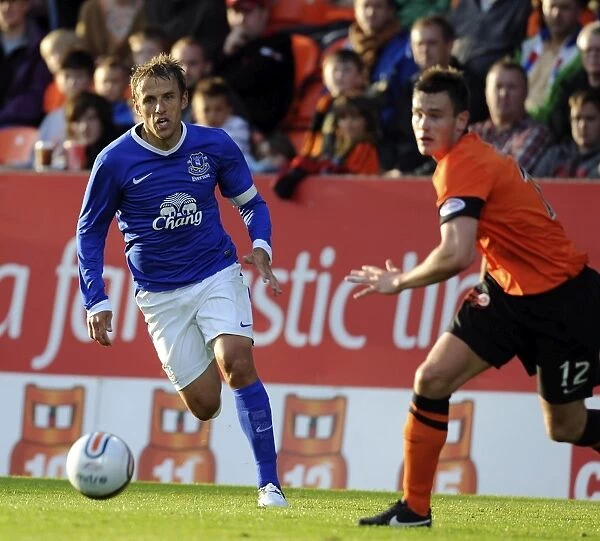 Everton's Phil Neville in Action: Pre-Season Friendly at Dundee United's Tannadice Park