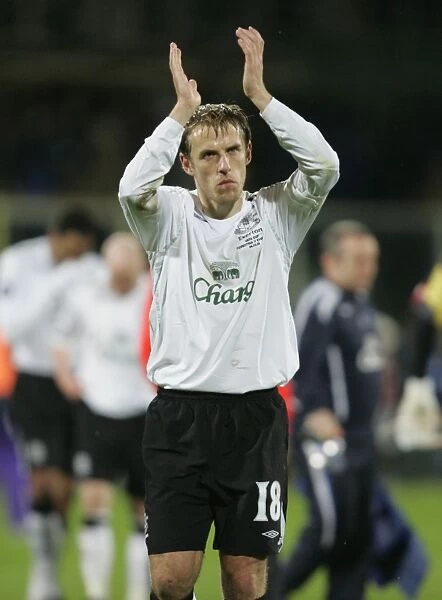 Everton's Phil Neville Celebrates with Fans after UEFA Cup Match vs Fiorentina (2008)