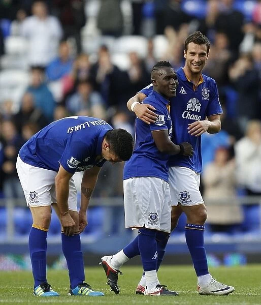 Everton's Royston Drenthe and Apostolos Vellios: Celebrating Victory Over Wigan Athletic at Goodison Park (September 17, 2011)