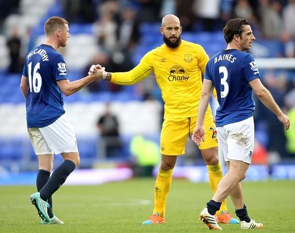 Everton's Tim Howard and James McCarthy: Celebrating a Hard-Fought Premier League Victory Over Aston Villa at Goodison Park