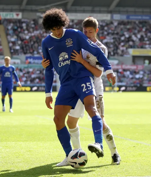 Framed Print : Everton's Triumph at Liberty Stadium: Fellaini vs. Davies in the Premier League's Intense Battle (September 22, 2012) Framed Print : Everton's Triumph at Liberty Stadium: Fellaini vs. Davies in the Premier League's Intense Battle (September 22, 2012)