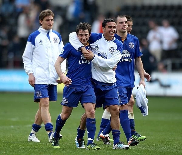 Everton's Triumphant Quartet: Tim Cahill, Nikica Jelavic, Darron Gibson, and Leighton Baines Celebrate Victory over Swansea City (24 March 2012)