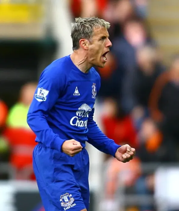 Framed Print : Everton's Unforgettable Moment: Neville and Cahill Celebrate Goal vs. Blackpool