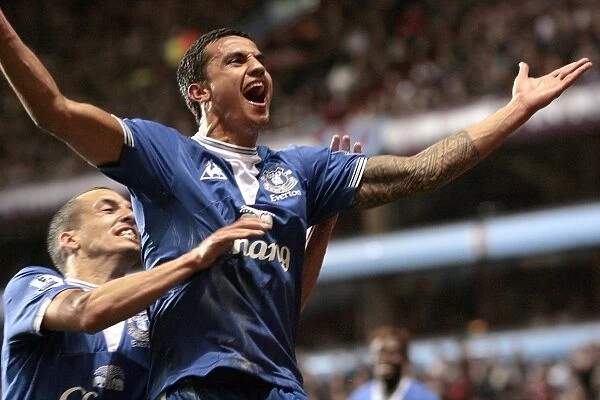 Everton's Unstoppable Duo: Tim Cahill and Leon Osman Celebrate Their Second Goal Against Aston Villa
