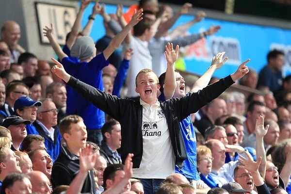 Everton's Unwavering Support: A Sea of Passion at Wolverhampton Wanderers vs Everton (Barclays Premier League, 09 April 2011)