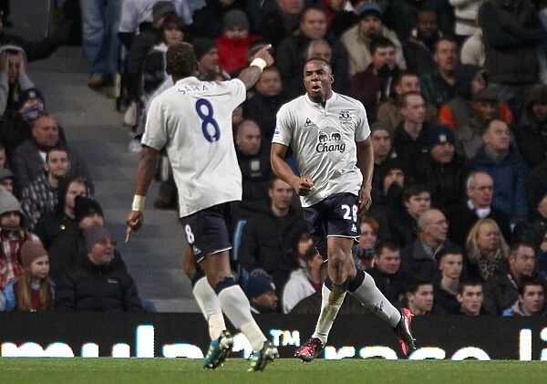 Everton's Victor Anichebe and Louis Saha: Celebrating Their First Goals Union at Aston Villa (January 14, 2012)