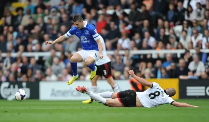 Framed Print : Everton's Victory: Kasami vs Mirallas Clash in Premier League Game (30-03-2014) - Everton 3-1 Fulham