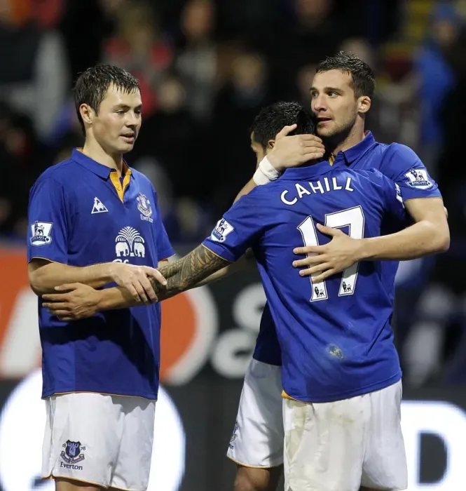 Framed Print : Everton's Victory Moment: Vellios, Bilyaletdinov, and Cahill Celebrate Second Goal Against Bolton Wanderers