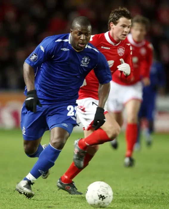 Framed Print : Everton's Yakubu Faces Off Against Petter Vaagan Moen of SK Brann in UEFA Cup Clash Framed Print : Everton's Yakubu Faces Off Against Petter Vaagan Moen of SK Brann in UEFA Cup Clash