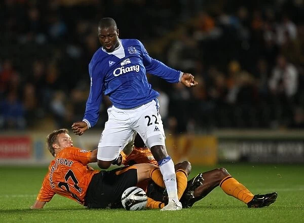 Everton's Yakubu Leaps Past Hull Defenders in Carling Cup Showdown