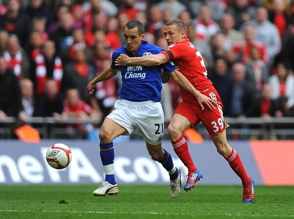 FA Cup Semi-Final Showdown: Osman vs Bellamy at Wembley Stadium (April 2012) - Everton's Leon Osman vs Liverpool's Craig Bellamy in Action