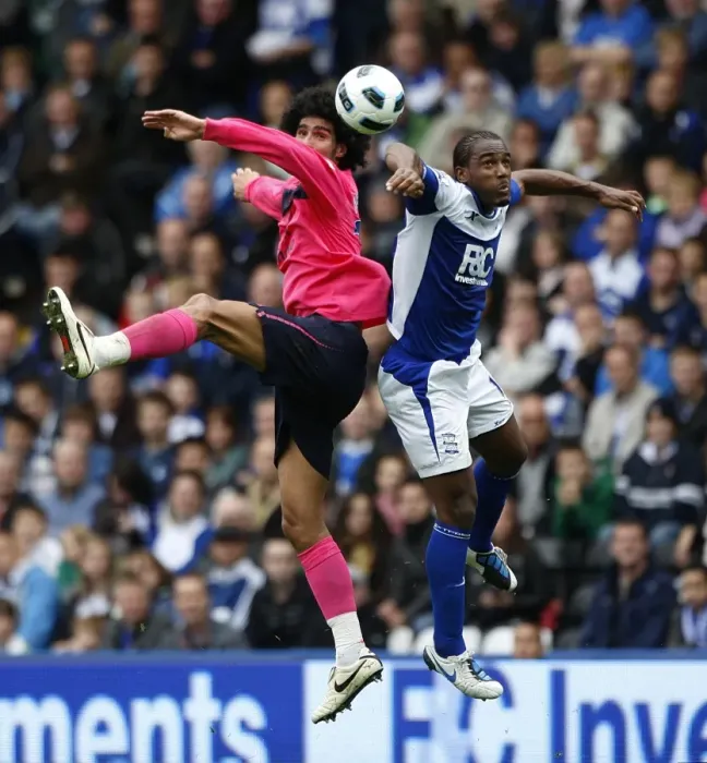 Framed Print : Fellaini vs. Jerome: A Battle for Ball Supremacy