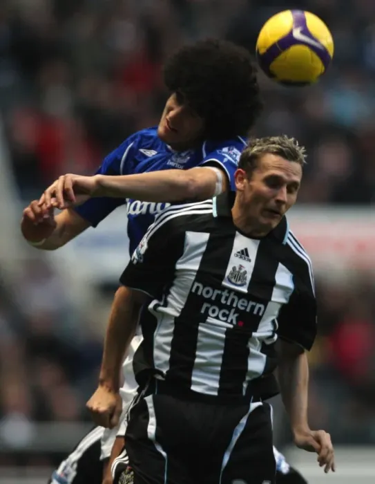 Framed Print : Fellaini vs Lovenkrands: A Battle of Strength and Skill in the 2008-09 Everton vs Newcastle United Barclays Premier League Match