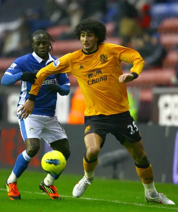 Framed Print : Fellaini vs. Moses: An Intense Barclays Premier League Battle at DW Stadium (04 February 2012) Framed Print : Fellaini vs. Moses: An Intense Barclays Premier League Battle at DW Stadium (04 February 2012)