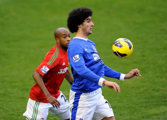 Framed Print : Fellaini vs. Tiendalli: A Battle at Goodison Park - Everton vs. Swansea City, Barclays Premier League (12-01-2013) Framed Print : Fellaini vs. Tiendalli: A Battle at Goodison Park - Everton vs. Swansea City, Barclays Premier League (12-01-2013)
