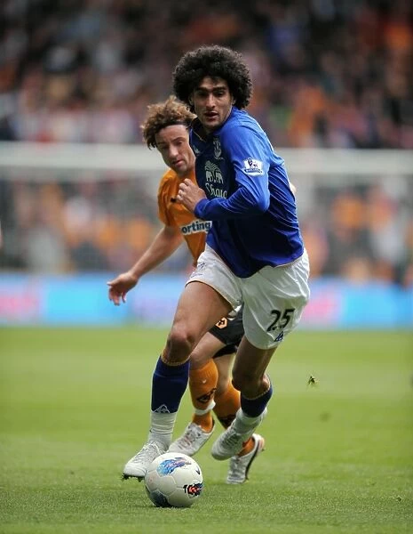 Fellaini vs. Ward: A Tense Battle Between Wolverhampton Wanderers and Everton in the Premier League (06 May 2012)
