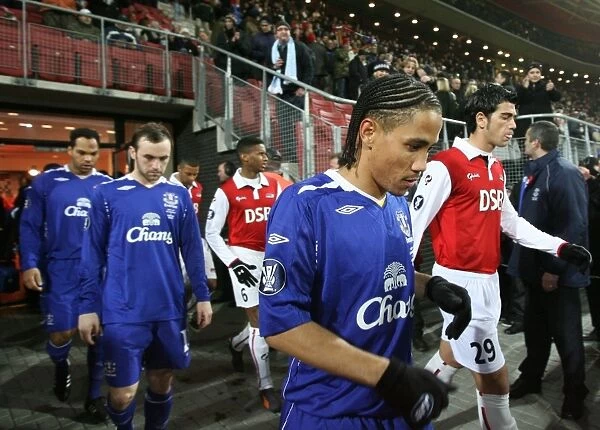 Football - AZ Alkmaar v Everton UEFA Cup Group Stage - Second Round Matchday Five Group A - DSB-Stadion, Alkmaar, Holland - 07  /  08 - 20  /  12  /  07 Evertons Steven Pienaar and team mates walk out for the start of the match with AZ Alkmaar players Mandatory Credit: Action Images  / 