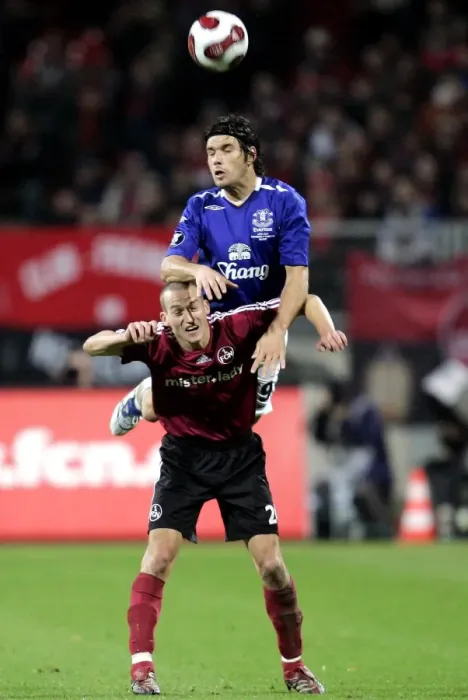 Framed Print : Football - FC Nurnberg v Everton UEFA Cup Group Stage - Second Round Matchday Two Group A - EasyCredit-Stadion, Nurnberg, Germany - 8 / 11 / 07 Evertons Nuno Valente in action with Nurnbergs Peer Kluge (bottom) Mandatory Credit: Action Images / Keith Framed Print : Football - FC Nurnberg v Everton UEFA Cup Group Stage - Second Round Matchday Two Group A - EasyCredit-Stadion, Nurnberg, Germany - 8 / 11 / 07 Evertons Nuno Valente in action with Nurnbergs Peer Kluge (bottom) Mandatory Credit: Action Images / Keith