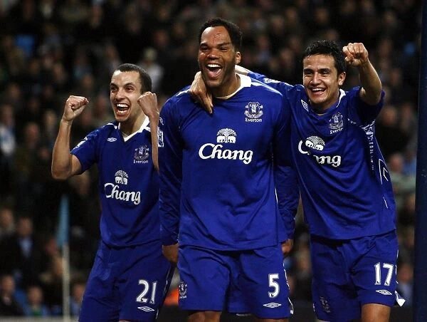 Football - Manchester City v Everton Barclays Premier League - The City of Manchester Stadium - 25  /  2  /  08 Evertons Joleon Lescott (C) celebrates with team mates Leon Osman (L) and Tim Cahill after scoring his sides second goal Mandatory Credit: Action Images  /  Jason Cairnduff Livepic