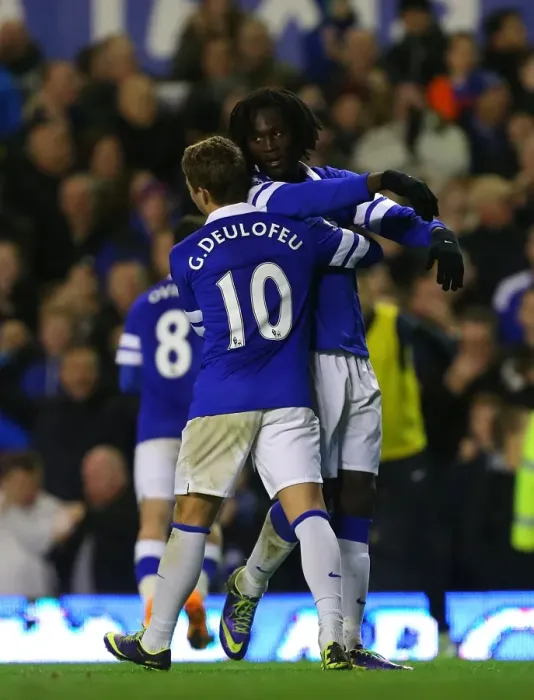 Framed Print : Four-Goal Blitz: Lukaku and Deulofeu Celebrate Everton's Dominance Over Stoke City (30-11-2013)