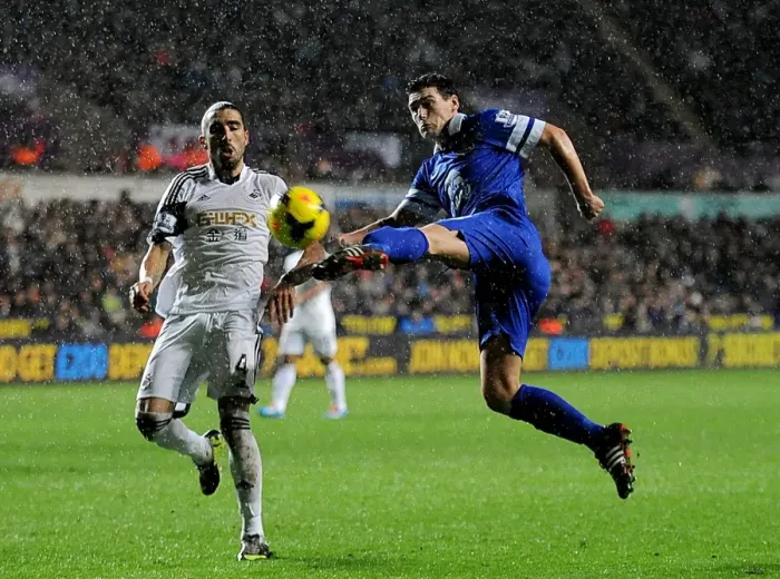 Framed Print : Gareth Barry vs Chico: Everton's Edge in Swansea City Showdown - Everton 2-1 (Barclays Premier League, Liberty Stadium, 22-12-2013) Framed Print : Gareth Barry vs Chico: Everton's Edge in Swansea City Showdown - Everton 2-1 (Barclays Premier League, Liberty Stadium, 22-12-2013)