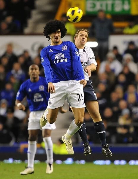 Head-to-Head at Goodison Park: A Battle of Aerial Supremacy between Fellaini and Davies (Everton vs. Bolton Wanderers, Barclays Premier League, 10 November 2010)