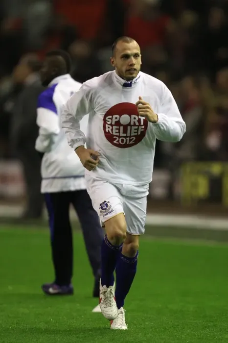 Framed Print : Heitinga at Anfield: Everton vs. Liverpool, Premier League Clash (13 March 2012) Framed Print : Heitinga at Anfield: Everton vs. Liverpool, Premier League Clash (13 March 2012)