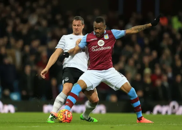 Framed Print : Intense Battle for Ball Possession: Jagielka vs. Ayew, Aston Villa vs. Everton, Premier League Framed Print : Intense Battle for Ball Possession: Jagielka vs. Ayew, Aston Villa vs. Everton, Premier League
