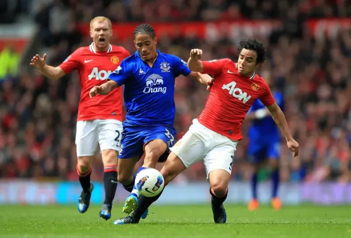 Framed Print : Intense Battle for Ball Possession: Rafael Da Silva vs. Steven Pienaar (Manchester United vs. Everton, Barclays Premier League, Old Trafford, 22 April 2012)