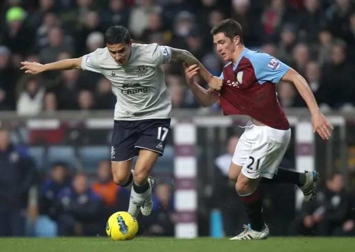 Framed Print : Intense Battle for Ball Possession: Tim Cahill vs. Ciaran Clark - Everton vs. Aston Villa (Premier League, 2012) Framed Print : Intense Battle for Ball Possession: Tim Cahill vs. Ciaran Clark - Everton vs. Aston Villa (Premier League, 2012)