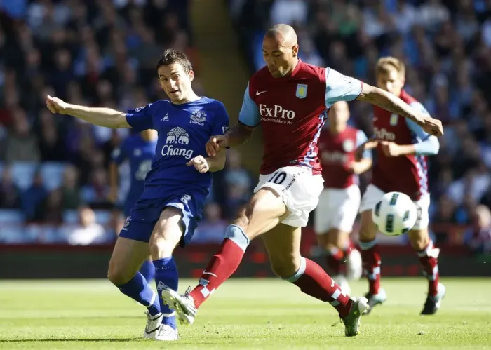 Framed Print : Intense Battle: Leighton Baines vs. John Carew - Everton vs. Aston Villa, Premier League (2010) Framed Print : Intense Battle: Leighton Baines vs. John Carew - Everton vs. Aston Villa, Premier League (2010)