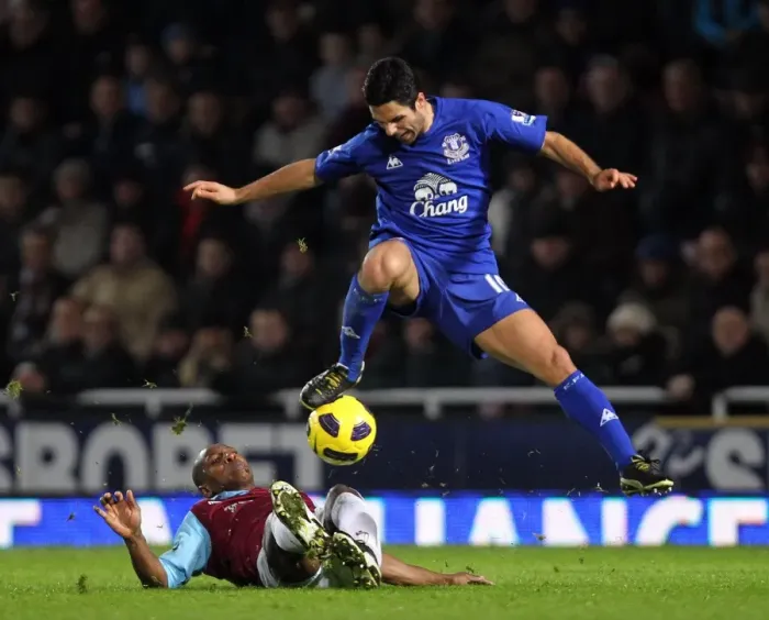 Framed Print : Intense Battle: Mikel Arteta vs. Luis Boa Morte - Unforgettable Tackle in the Barclays Premier League Clash between West Ham United and Everton (December 2010, Upton Park)
