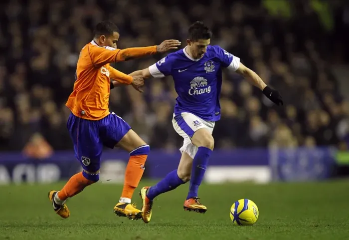 Framed Print : Intense Battle: Mirallas vs Brown in Everton's FA Cup Fifth Round Replay Win Against Oldham Athletic (26-02-2013)